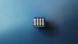 (5)  5435640-2 DIP Switches / SIP Switches SPST 4POS RCKR UNSLD T/H DIP SWITCH